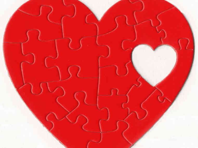 Jigsaw puzzle in the shape of a heart
